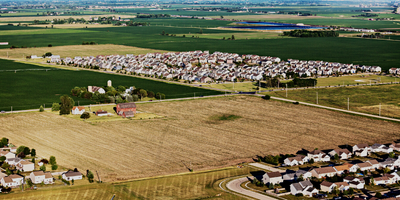 housing subdivision with farmland surrounding